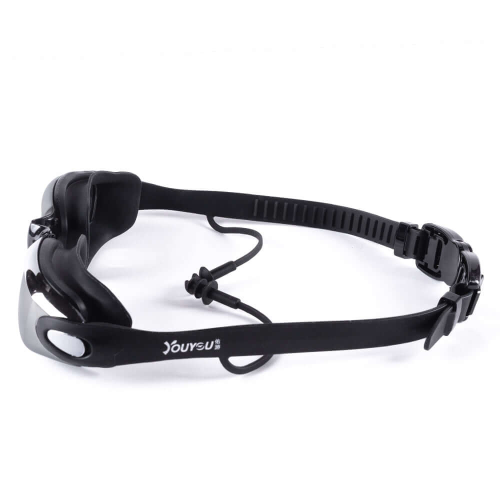 YouYou swim goggles with ear plugs, anti-fog coating, UV protection, and flexible silicone straps for comfort.