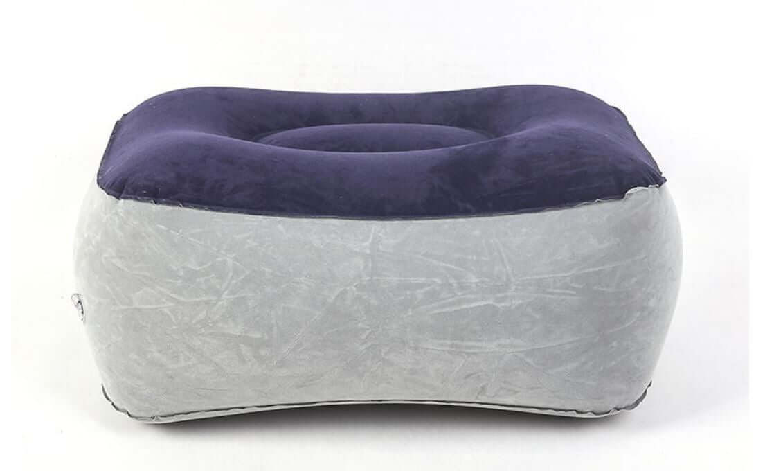 Inflatable foot rest pillow designed for comfort and support during long periods of sitting or standing.