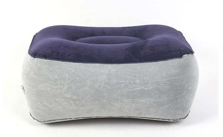 Inflatable foot rest pillow designed for comfort and support during long periods of sitting or standing.