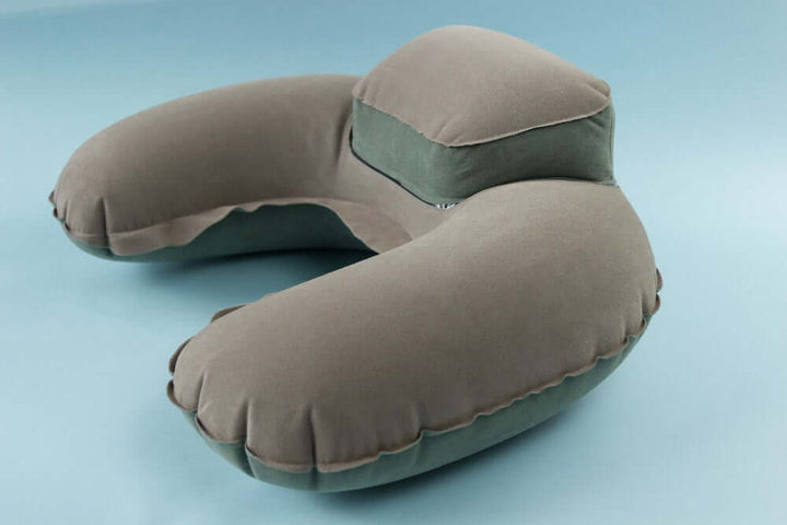 Inflatable U-shaped travel neck pillow with headrest for maximum comfort during travel.