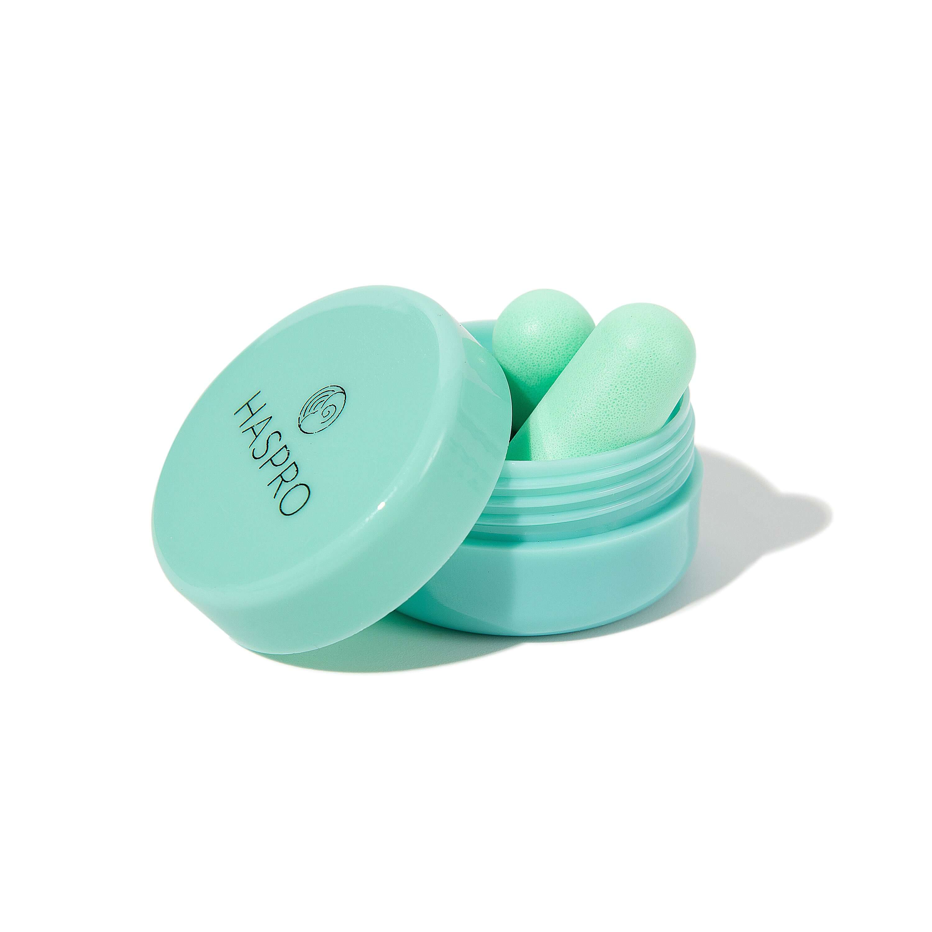 HASPRO Tube50 mint earplugs in a plastic case for noise reduction, featuring soft polyurethane foam design.