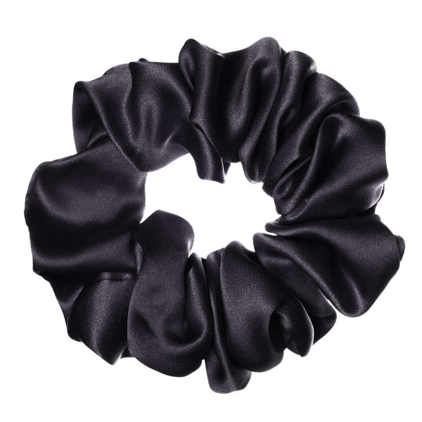 Pure mulberry silk scrunchie in black, featuring high elasticity and a smooth finish for all hairstyles.
