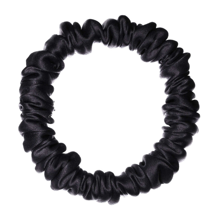 Pure Mulberry silk scrunchie in black, high elasticity, gentle on hair, perfect for various hairstyles.