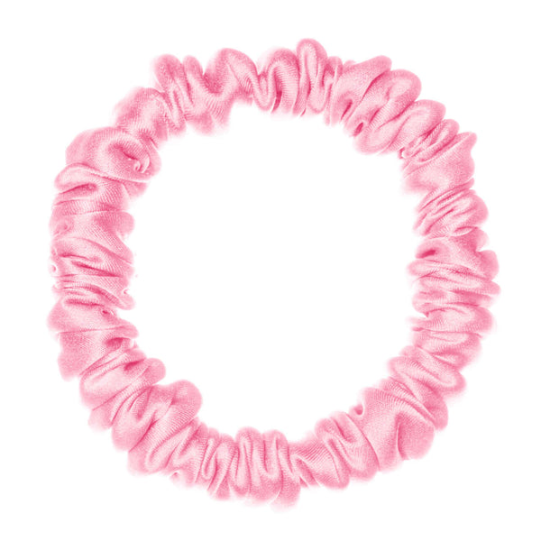 Pure Mulberry silk scrunchie in pink, high elasticity and gentle on hair for versatile hairstyles.