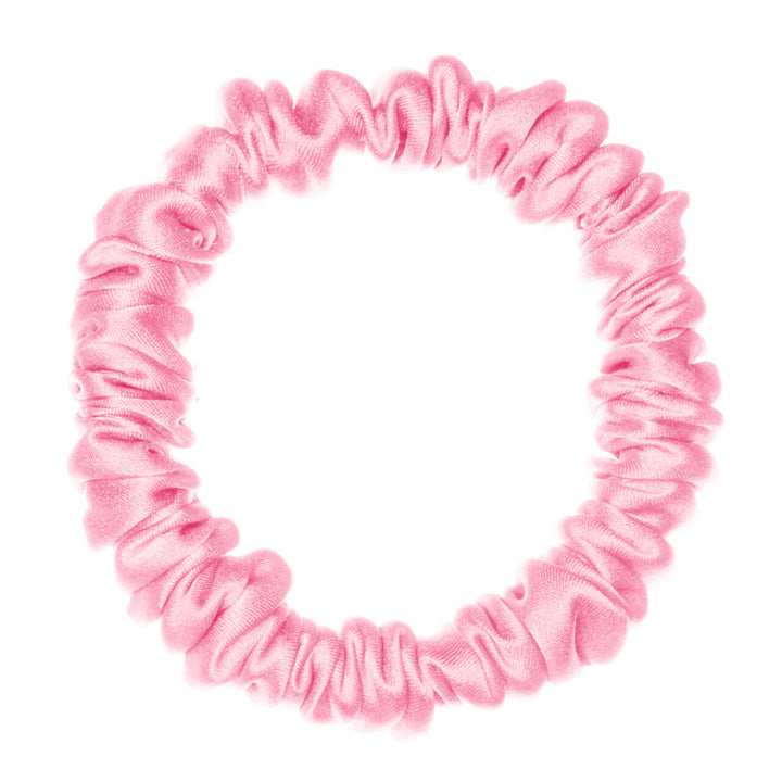 Pure Mulberry silk scrunchie in pink, high elasticity and gentle on hair for versatile hairstyles.