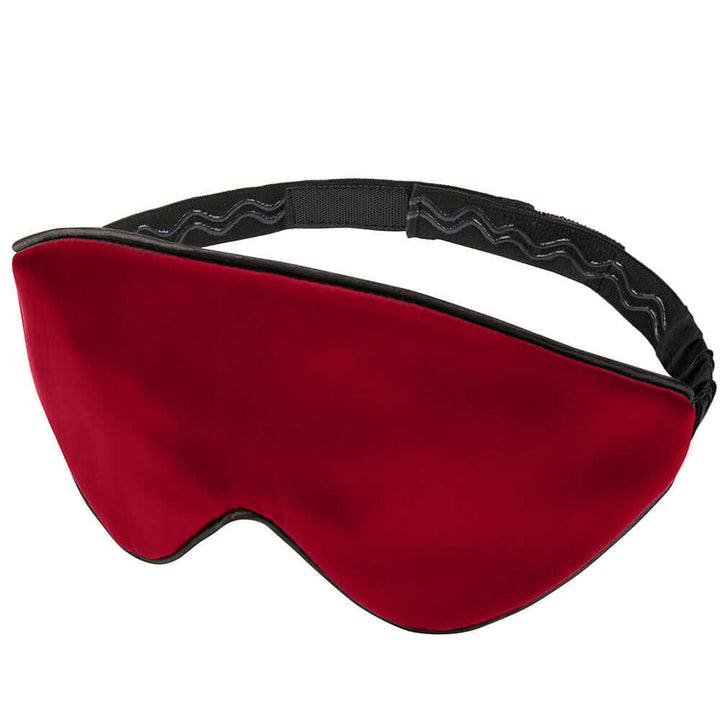Quietstore 3.0 silk sleep mask in red, designed for comfort, with non-slip strap for secure fit and zero eye pressure.