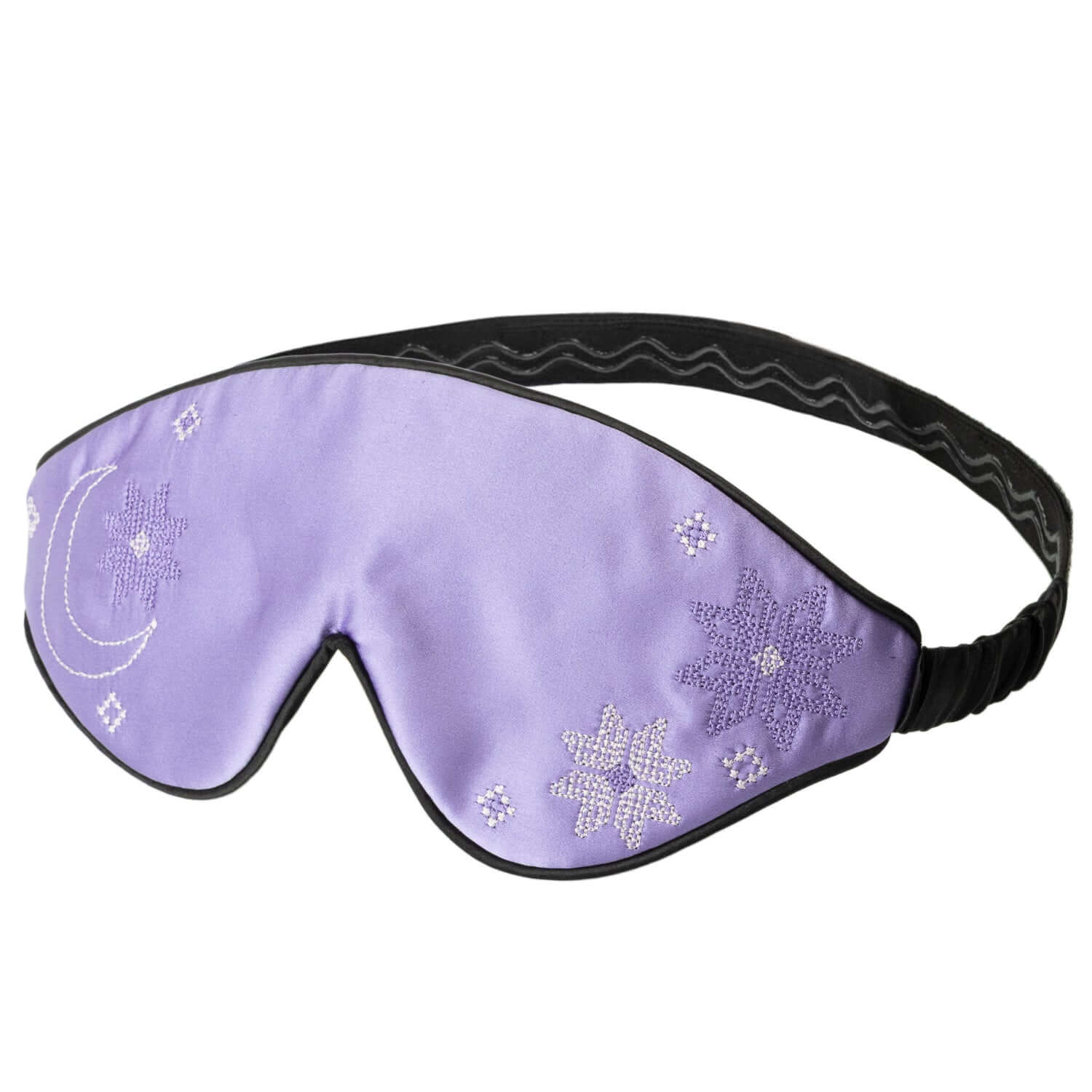 Quietstore 3.1 silk sleep mask in lavender with Ukrainian embroidery and adjustable strap for comfort.