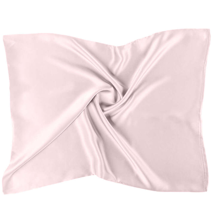 Quietstore mulberry silk pillowcase in soft pink, designed to enhance hair and skin health, 20x26 inches.