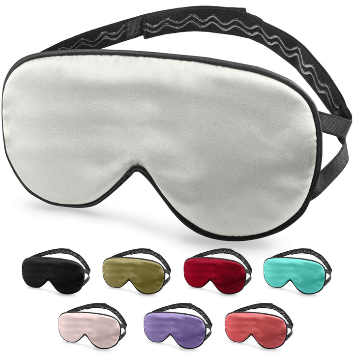 Quietstore silk sleep mask in various colors with non-slip strap for restful sleep and light-blocking design.