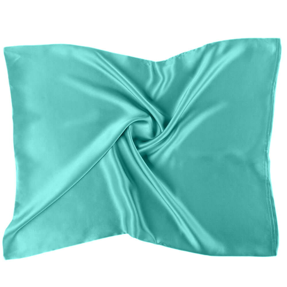 Turquoise mulberry silk pillowcase designed for healthier hair and skin, measuring 20x26 inches.